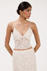 Front view of cream lace bra top
