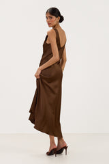 Side view of dark brown satin maxi slip dress