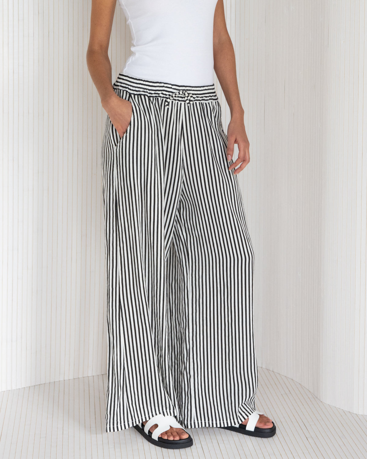 Striped white and black pants sales