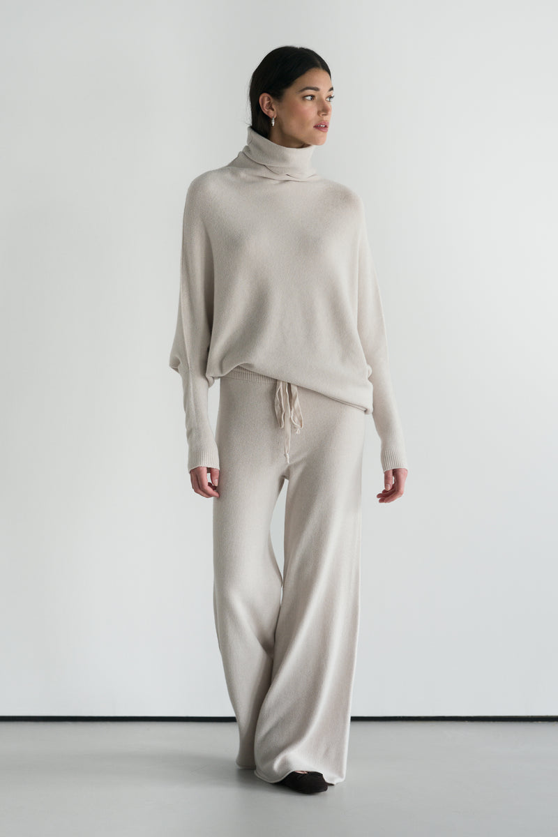 Asymmetric Draped Roll Neck | Light Beige | Seamless Knit