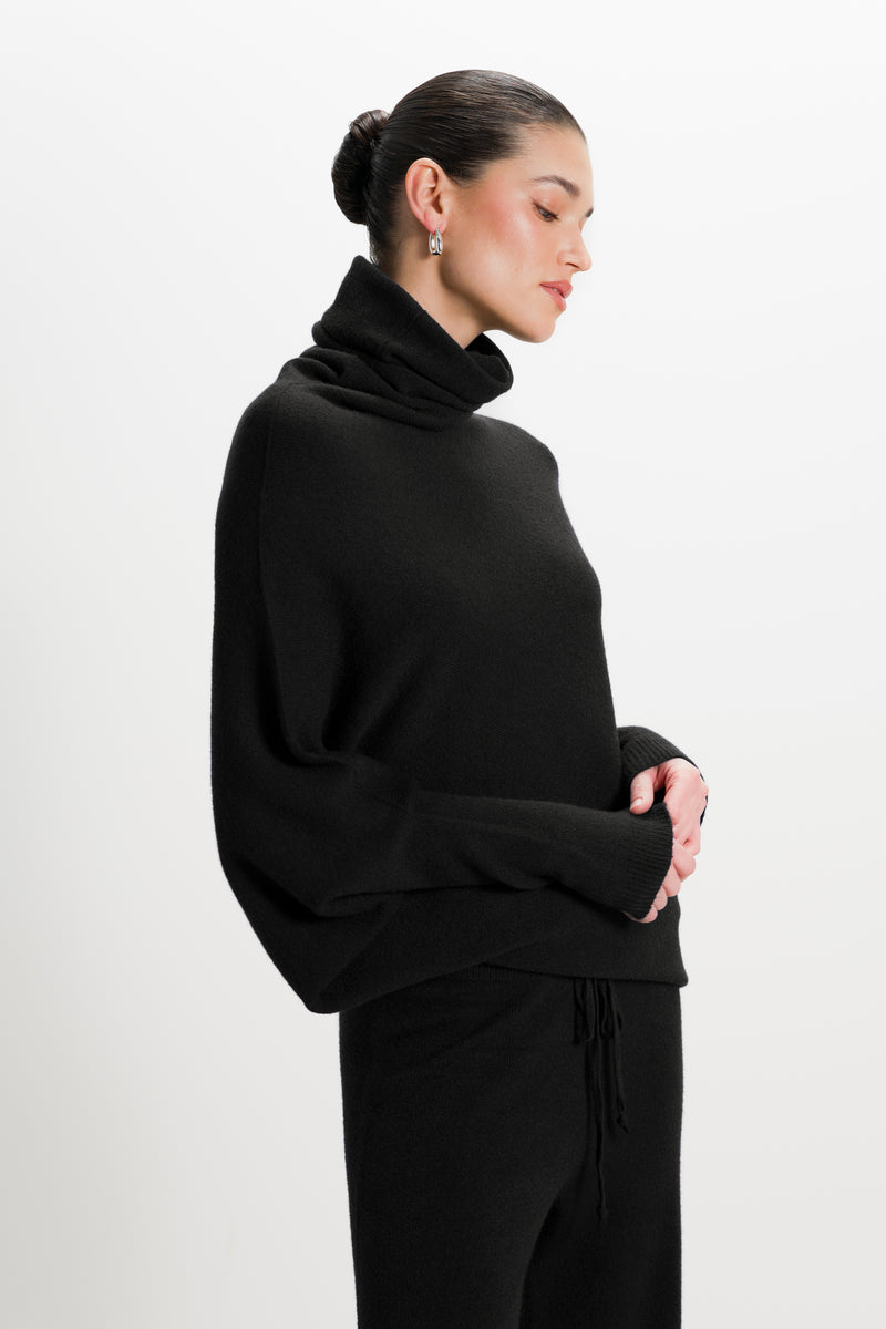 Asymmetric Draped Roll Neck | Black | Seamless Knit