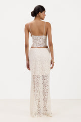 Back view of cream lace maxi skirt with inner lining, paired with a matching lace bra top