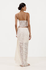 Back view of cream lace bra top paired with matching lace maxi skirt